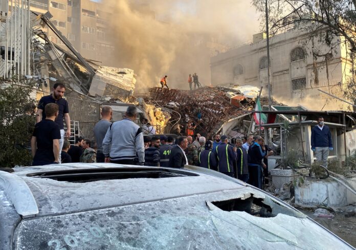Smoke rises after what the Iranian media said was an Israeli strike on a buidling close to the Iranian embassy in Damascus, Syria April 1, 2024.