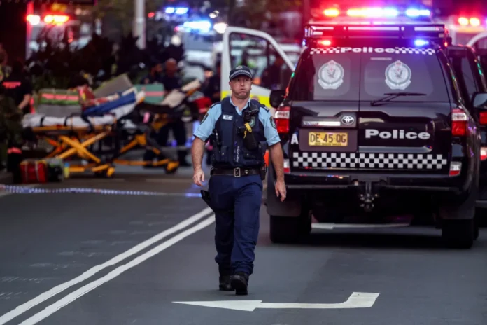 A man who fatally knifed six people in a Sydney mall was shot dead by police in the beachside suburb of Bondi on Saturday, authorities said, as hundreds fled the scene.